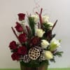 A stunning, tall arrangement consisting 1 dozen mix red and white roses