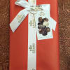 Red wrapped box with the best selection of fine chocolates. 4.55 oz.