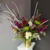 A beautifully selected bunch of the freshest flowers in a vase uniquely
