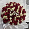 This bouquet is made with 50 white and 50 red roses, perfect