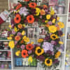 24 inch wreath 
Banner included add to notes for the florist /special