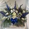 Floral basket in whites and blues to remember that special person or