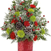 Holiday Cheer Tree spreads seasonal joy with red blooms, green mums, and