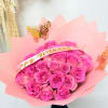 Charming pink flower bouquet featuring 50 fresh pink roses, beautifully arranged and
