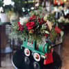 All aboard The Peppermint Express! This festive toy train is filled with