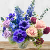 Give the gift of Faith our lush romantic arrangement with lavender, blue