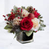 A Festive Mini Arrangement for Big Holiday Cheer

Bring a burst of joyful