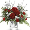 Get in the holiday spirit this holiday with this beautiful Christmas arrangement