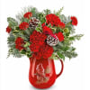 Beautiful pitcher with fresh pine branches and lovely natural flowers, perfect for