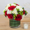 This floral arrangement is perfect to brighten up your holiday decor this