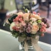 Peach Roses, Peach Spray roses, Lisianthus, Pink Alstromeria, White Carnations, Seeded Eucalyptus.