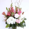 The perfect arrangement for your darling.This vase arrangement is designed with an
