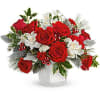 A beautiful combination of white and red flowers with elegant foliage.