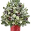 Winter Whisper Tree glows with soft white blooms, pinecones, and winter greens.