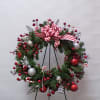 A beautiful candy cane silk wreath perfect for the holiday season. 