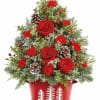 Holiday Traditions Tree is a fresh twist on classic cheer. Adorned with