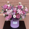 Double-sided arrangement in a box.

The color scheme of the arrangement is lavender