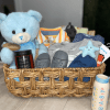 Welcome the newest little guy home with a gift basket bursting with