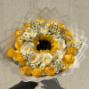 1 sunflower flower in the middle with a ring of white roses