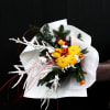 The Festive Glow Bouquet is a radiant celebration of the holiday spirit