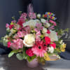 Celebrate in full colour with this joyful floral arrangement, designed to brighten