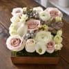 Beautifully designed arrangement in a 7"X 7" square wood box with ivory