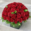 This arrangement includes 50 roses in 6in glass vase.  You have