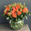 This luxury hand-tied arrangement contains roses and premium fillers beautifully laid out