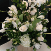 WHITE PHAL ORCHIDS, TULIPS, ROSES, SPRAY ROSES, WHITE FILLER FLOWERS AND ASSOTED