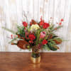 Beautiful seasonal blooms arrive in a magical gold dipped vase