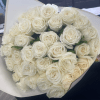 A hand-wrapped bouquet of 25 white garden roses, featuring a clean, elegant