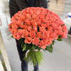 A stunning standing bouquet of 75 fresh cut coral peach  roses