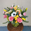 This is a fun and colorful arrangement. Perfect for Spring and Summer.