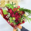 Beautiful Christmas bouquet made with fresh seasonal flowers, perfect for celebrating the