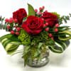 A simply sweet red rose arrangement for your Valentine this year. Complimented