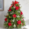 Celebrate the season with this festive floral arrangement designed in the shape