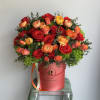 Deep orange and light orange flowers create a beautiful contrast in a