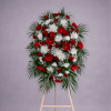 A classic standing funeral wreath designed to express love, sympathy, and remembrance.