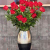 A timeless expression of passion and refinement, this arrangement features premium long-stem