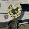 A standings flower arrangement for a funeral service is a heartfelt tribute