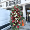 A standings flower arrangement for a funeral service is a heartfelt tribute
