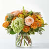 A bright golden hour tone flower arrangement - with pink or yellow