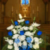 Blue and white floral basket spray 
Includes banner message , add message