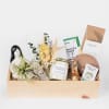 Zen gift box includes : Seasonal flower arrangement, Wax &amp; Wane Candle