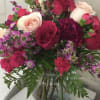 Hot pink roses, light pink roses , purple wax,hot pink spray rosesplum