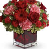 Perfect for your valentine. This arrangement is designed in a red cube