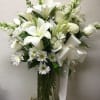 Type of Flowers: White Roses, White Oriental Lilies, White Snapdragons, Daisies, Mums