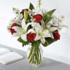 Elegantly crafted with a stunning mix of red and white blooms.
Details
The Deluxe