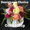 Allow our designers to create a beautiful arrangement in an adorable coffee