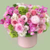A vibrant and lively arrangement of fresh flowers, including fresh pink roses